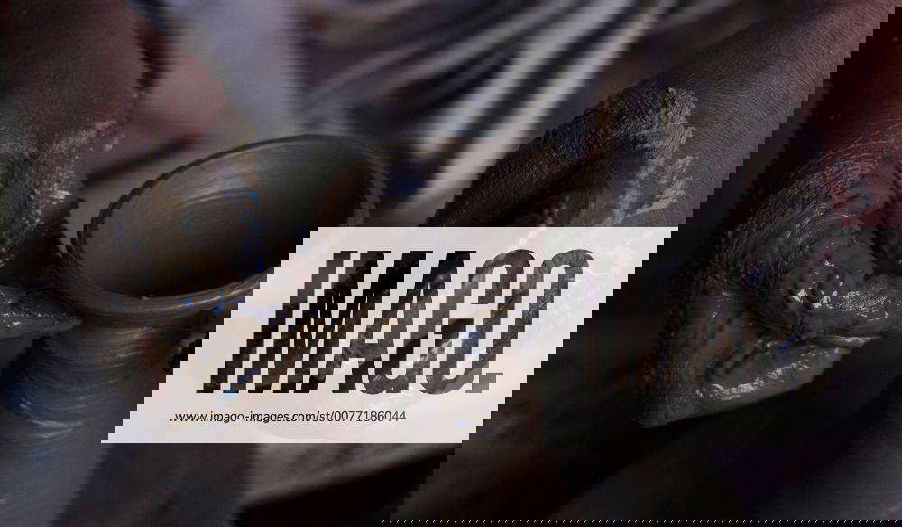 Lahore Pakistani Artisan Preparing Clay Pot An artisan uses a pottery