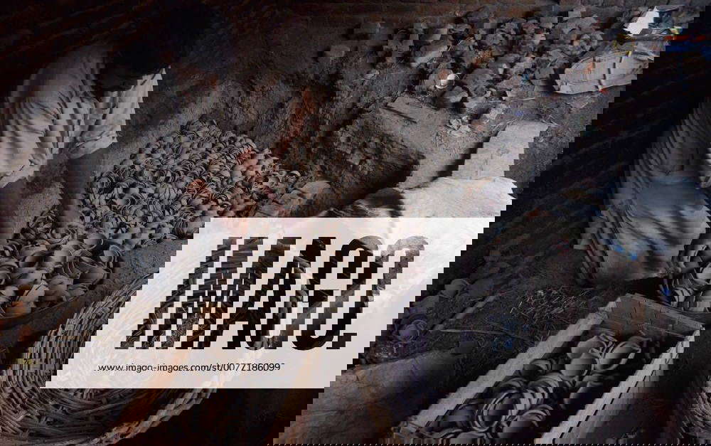 Lahore Pakistani Artisan Preparing Clay Pot An artisan uses a pottery