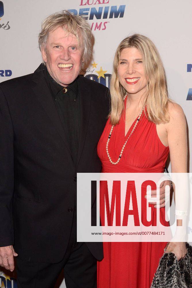 LOS ANGELES - FEB 26: Gary Busey, wife at the 27th Annual Night of 100 ...