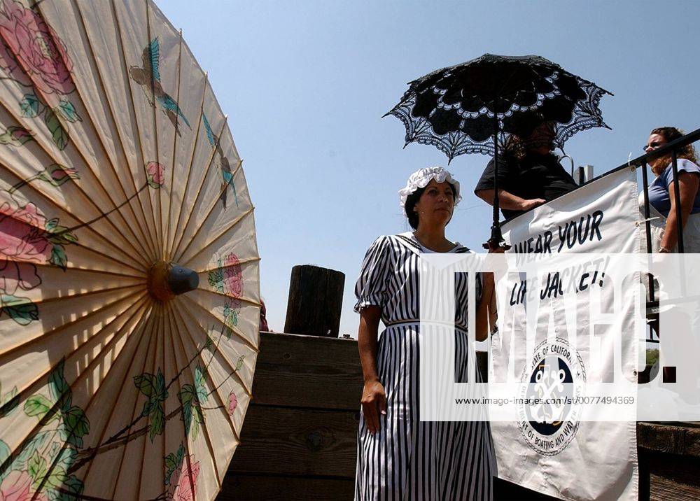 Barbara Dunn (rt) models a 1896 swim suit during the History of Bathing