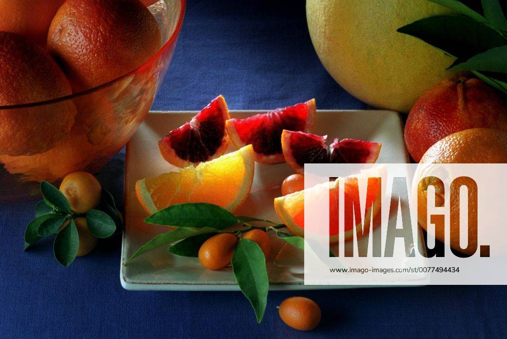 This photo of citrus fruits includes navel oranges, cara navel oranges