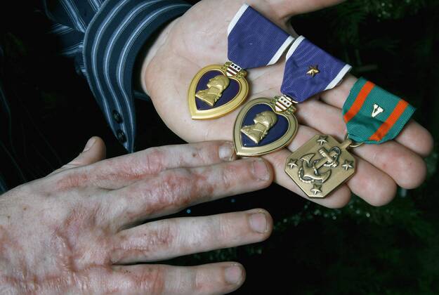 Handville NP_280160_GARN_Handville_1.CAPTION: Marine Cpl. Nathan Handville, who ...