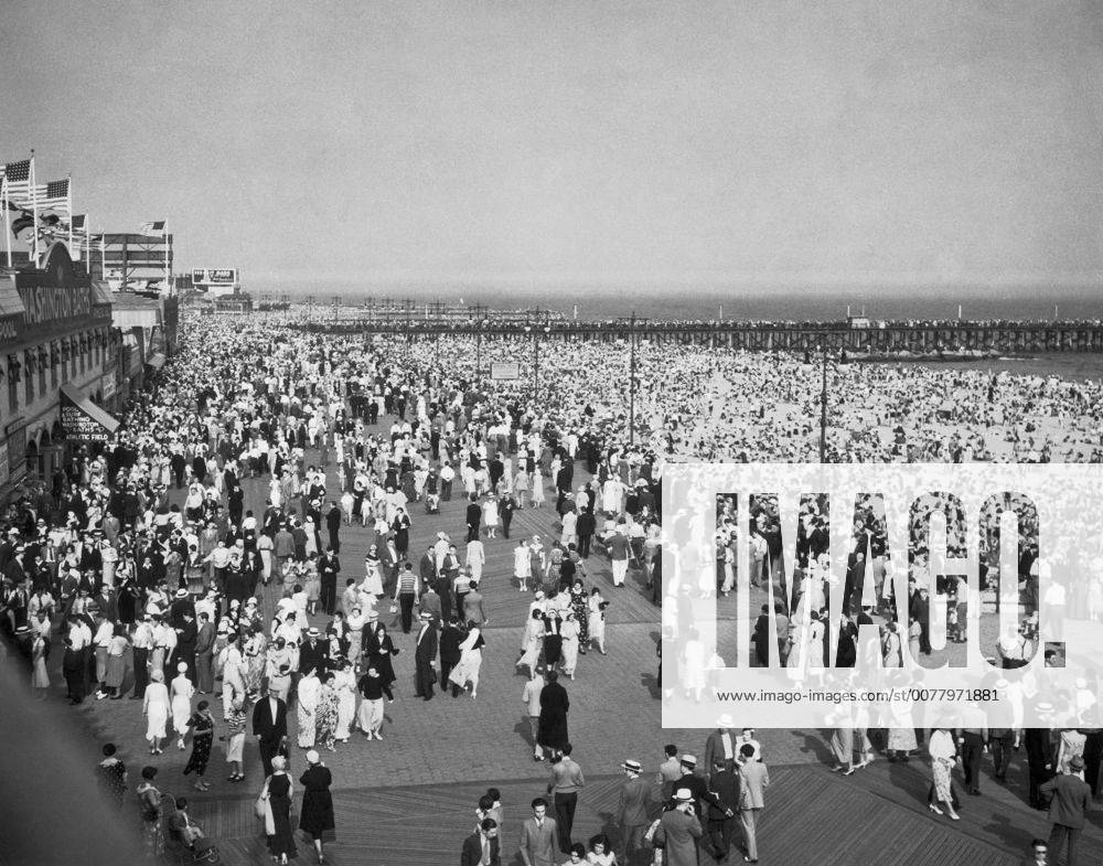 New York, New York: c. 1925 Crowds on the boardwalk at Coney Island in ...