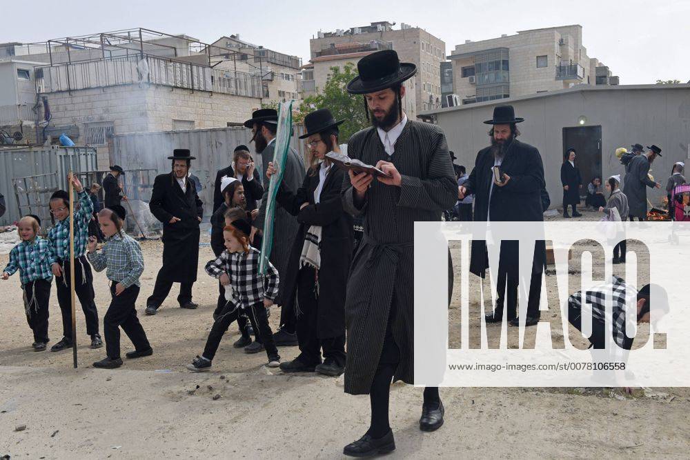 An Ultra-Orthodox Jew prays at a site where leaven food products are ...