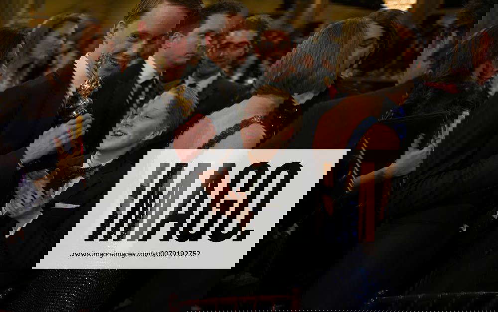 Charles Foster and Kit Bernard Foster son of Jodie Foster at the 70th