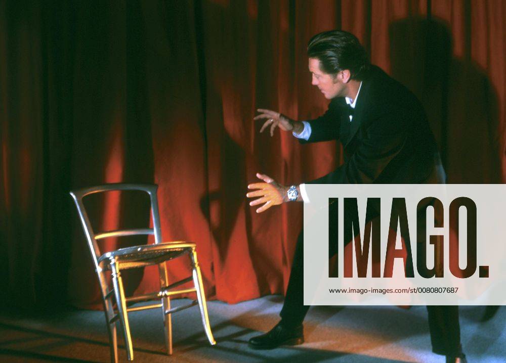 Magicians Hands mesmerizing a chair to make it dance. Checked