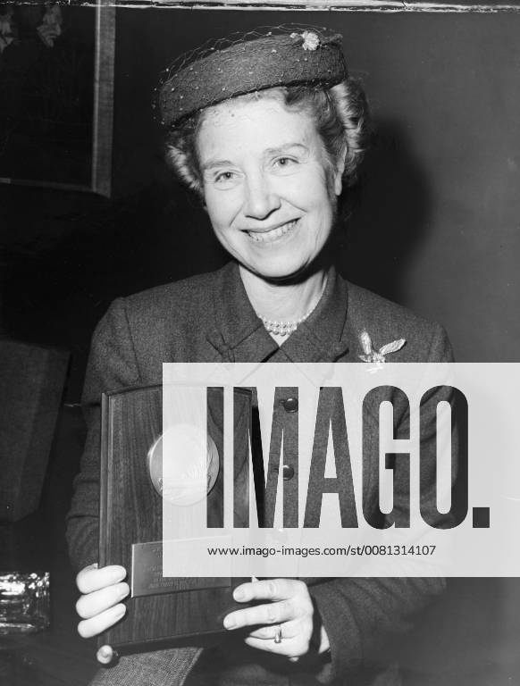 Mrs Spencer Tracy wife of the actor, holds the save the children ...