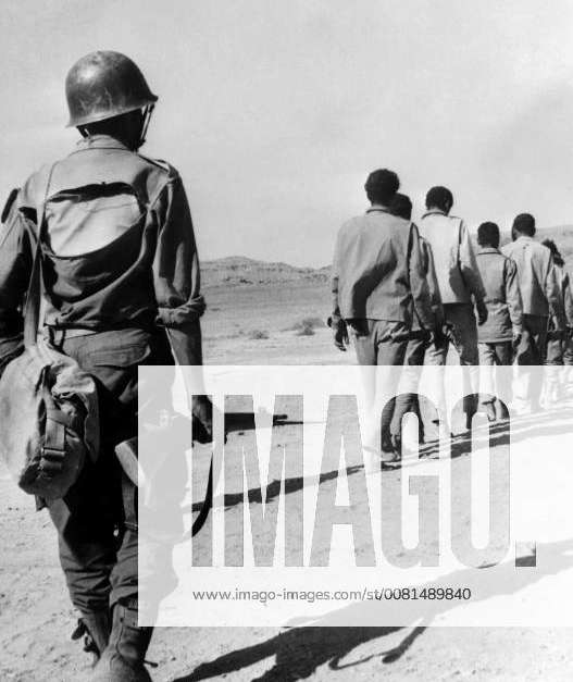 20 OCTOBER 1963 A MOROCCAN SOLDIER WITH PRISONERS FROM THE MARRAKESH