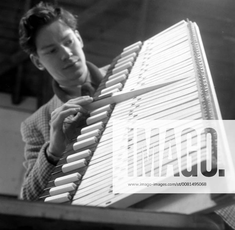 ANDREW GARRETT AT WORK ON HARPSICHORD AT THE LYMINGE FACTORY IN