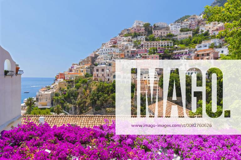 The lovely resort of Positano climbs up the Bougainvillea clad hillside ...