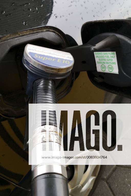 Dusseldorf Germany Downtown fuel nozzle stuck in a filler neck of a