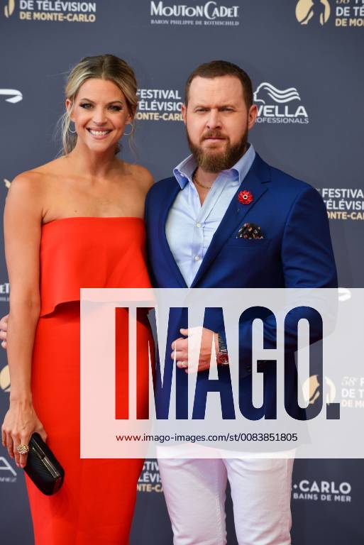 A. J. Buckley (R) and Abigail Ochse attends during the red carpet from ...