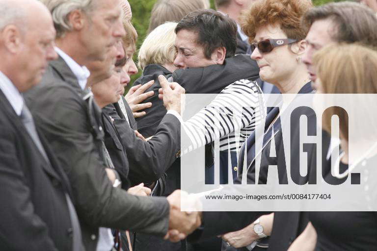 , BRUSSELS, BELGIUM : People greet the family and relatives at the ...