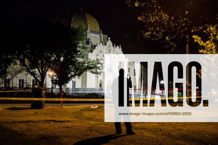 July 29, 2018 Chicago, IL, USA James Hawthorne, 35, talks on his phone while police work the