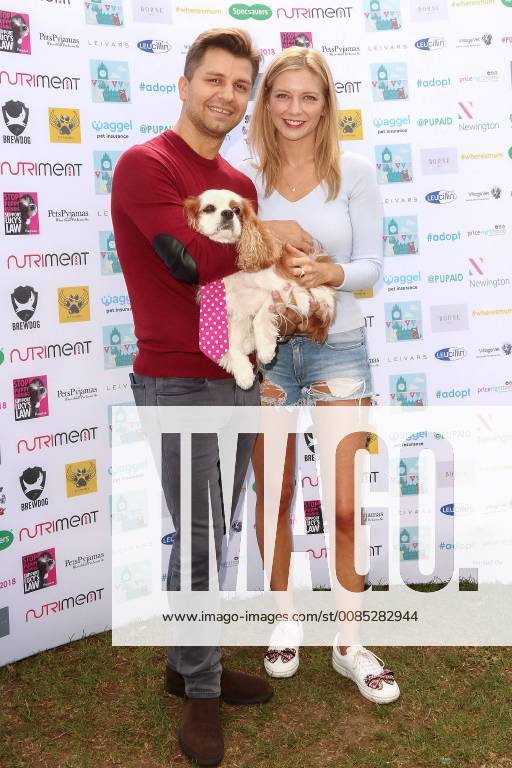 Rachel Riley and her friend Pasha Kovalev at the PupAid Puppy Farm ...