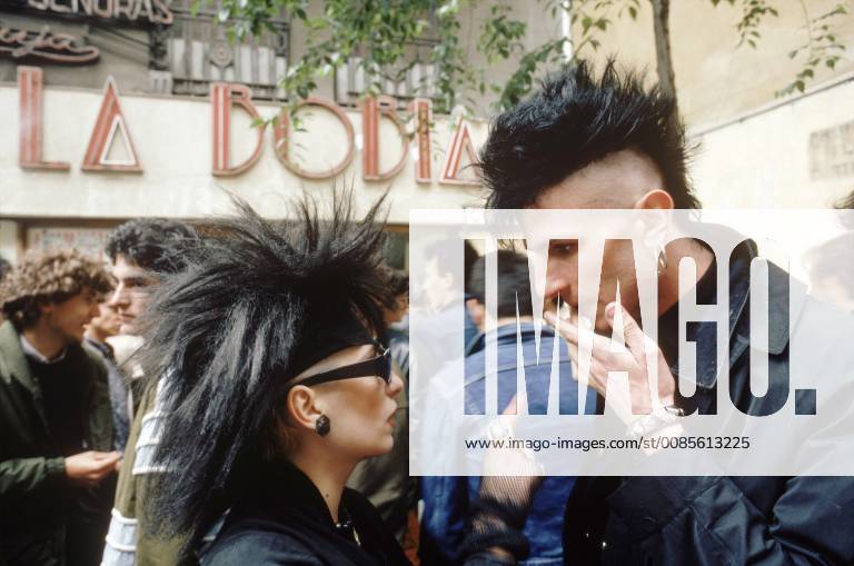 Punk hair cuts and conversation at La Bobia, a Madrid, Spain cafe ...