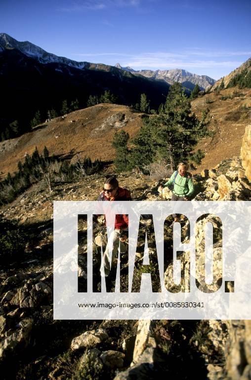 Kasha Rigby and Julian Carr hike along a trail in the Wasatch in Salt ...