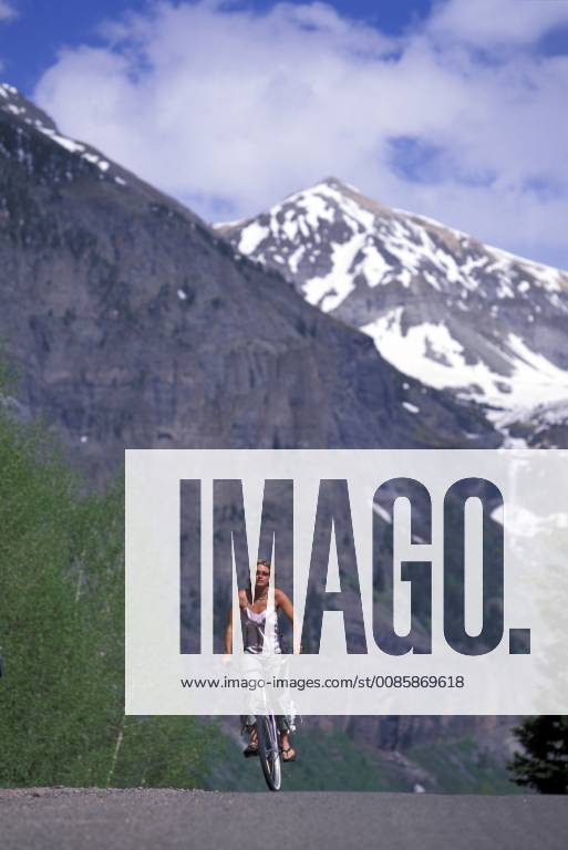 Telemark skier Kasha Rigby rides down a back road in telluride ...