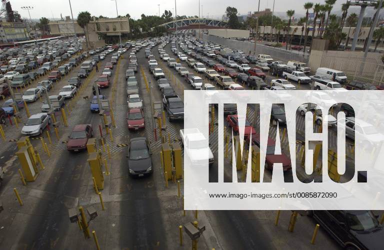 San Diego, California Long lings of cars wait to enter the United