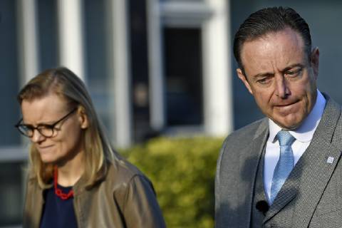 Bart De Wever and his wife Veerle Hegge cast their vote at a polling ...