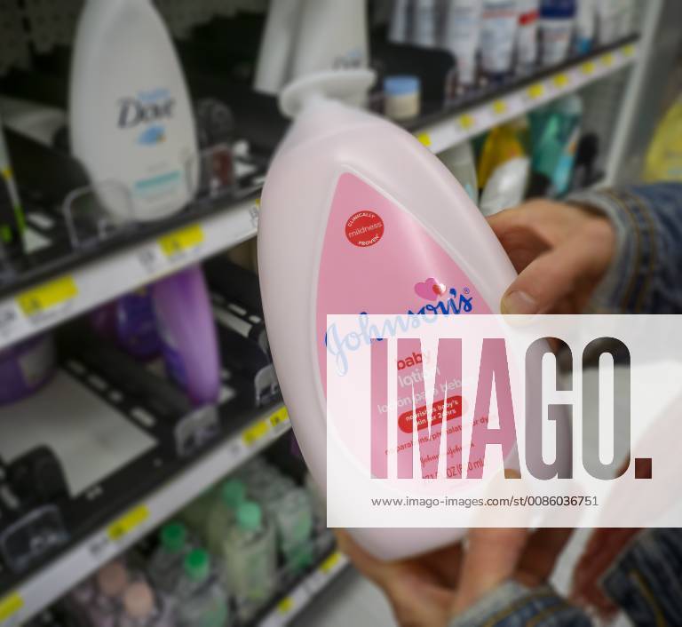 In advance of Johnson & Johnson earnings call A shopper chooses a