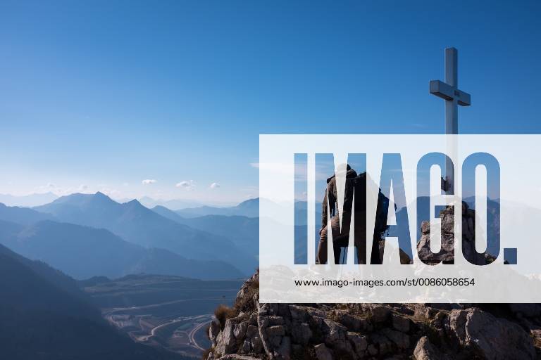 vordernberg-theme-picture-hikers-stand-at-the-summit-cross-and-look-at