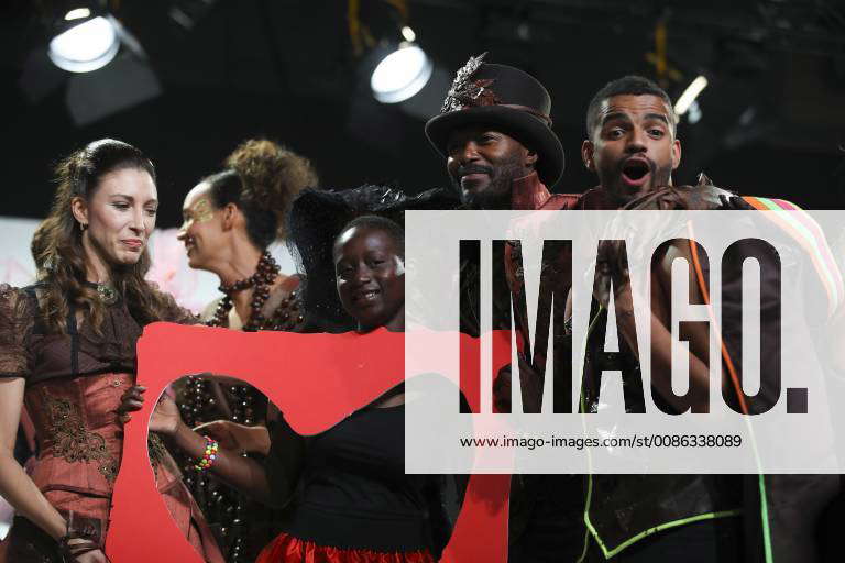 Silvia Notargiacomo Djibril Cisse et Brahim Zaibat CELEBRITES : Defile