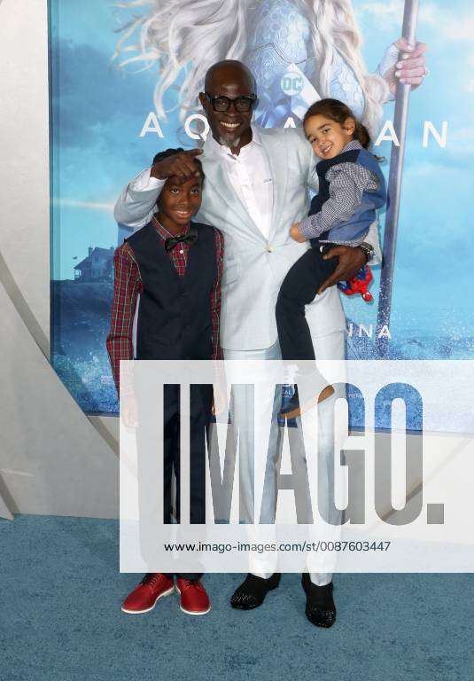 HOLLYWOOD, CA - DECEMBER 12: Kenzo Lee Hounsou, Djimon Hounsou, at Premiere  Of Warner Bros. Pictures