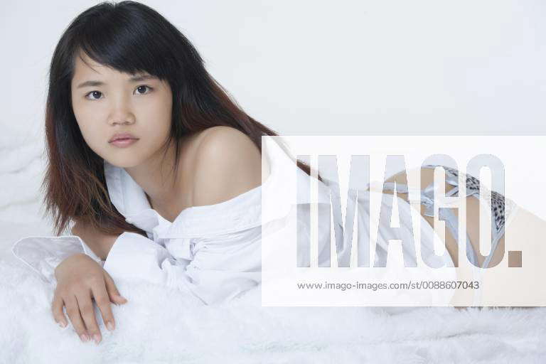 Sexy Chinese Woman Wearing A White Shirt Model Released Symbolfoto Y