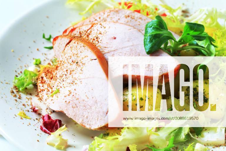 Roast turkey breast and potatoes