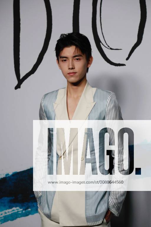 Chinese actor Chen Feiyu attends the Dior Homme fashion show during the ...