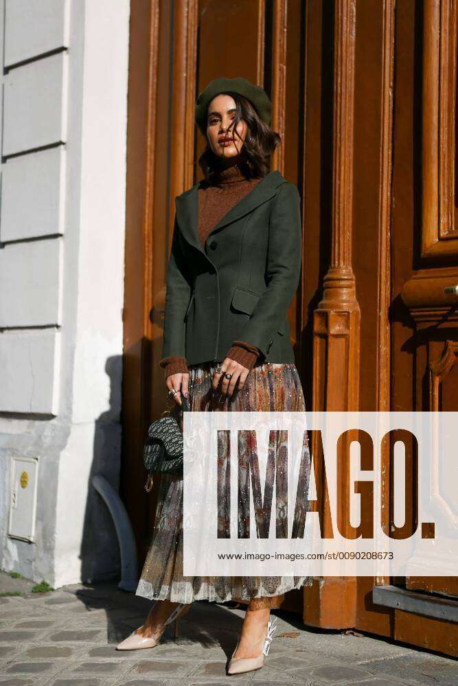 Camila Coelho attends the Christian Dior Show during Paris Fashion