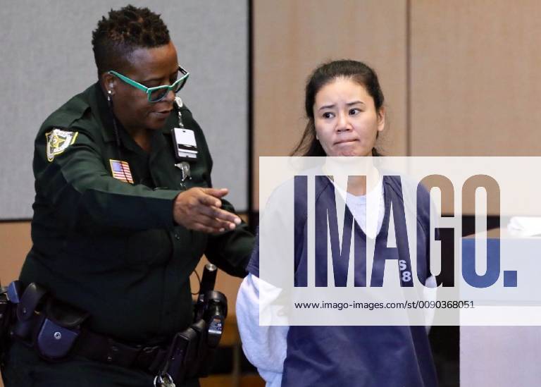 March 28, 2019 - Florida, U.S. - Lei Wang enters court for a bond ...