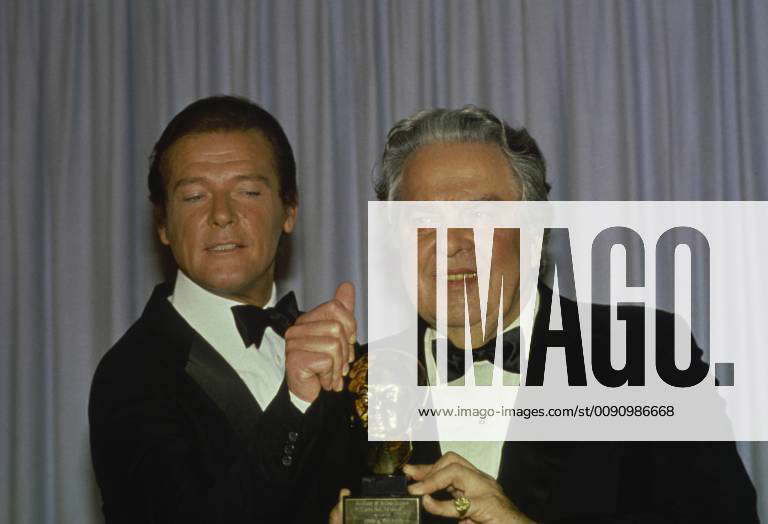 ROGER MOORE presents the Irving G. Thalberg Award to ALBERT R. Cubby ...