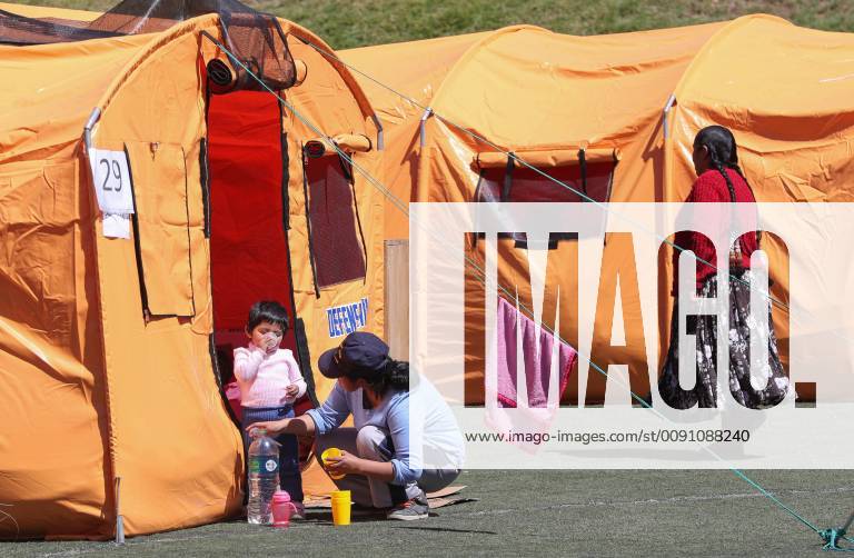 Bolivian citizens affected by the landslide are sheltered in one of the ...