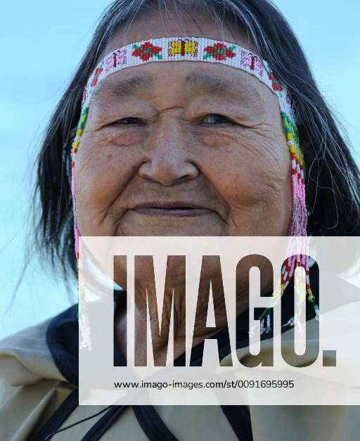 CANADA Head portrait of Portrait of Inuit shaman woman, wearing ...