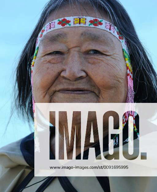 CANADA Head portrait of Portrait of Inuit shaman woman, wearing ...