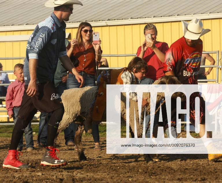 June 29, 2019 - Waynesville, Ohio, USA - A Boy hold on to a Sheep as ...