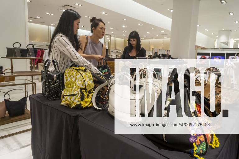 Neiman Marcus department store in New York Tourists browse discounted