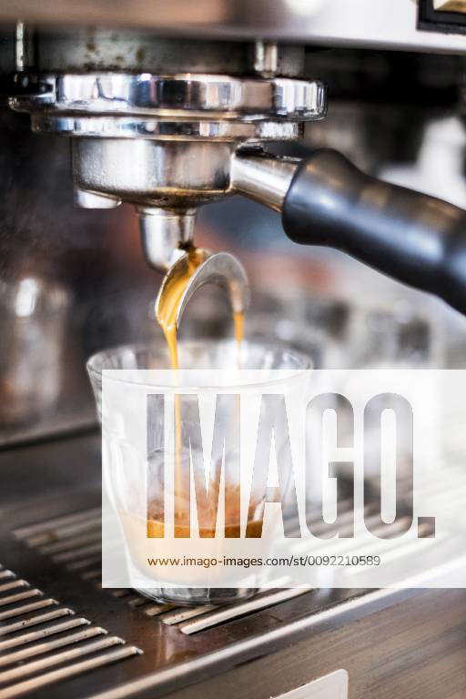 Coffee Machine Preparing an Espresso for Customers` Breakfast in a European  Coffee Shop Stock Photo - Image of pouring, maker: 172942282