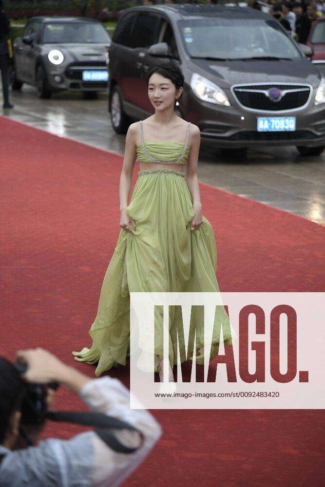 Chinese actress Zhou Dongyu poses as she arrives on the red carpet