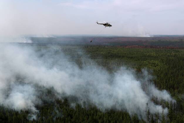 KRASNOYARSK TERRITORY, RUSSIA - AUGUST 3, 2019: A helicopter of the ...