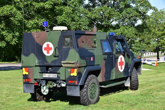 Paramedics recover an injured person with the armoured ambulance EAGLE ...