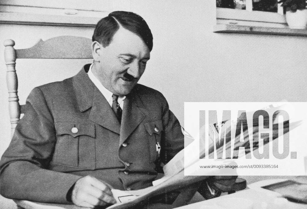 Adolf Hitler at the Berghof, 1935 Adolf Hitler reading the press at ...