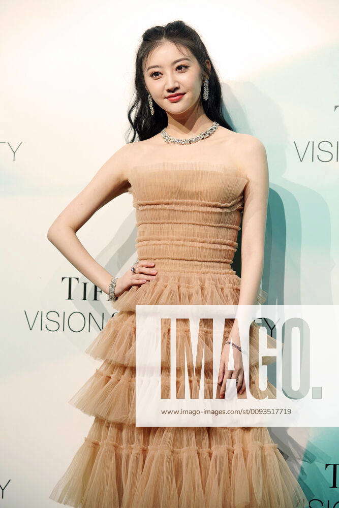 Chinese actress Jing Tian wears a nude-color dress attending the ...