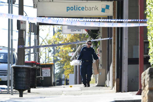 PENRITH POLICE SHOOTING, Police examine a crime scene outside Penrith ...