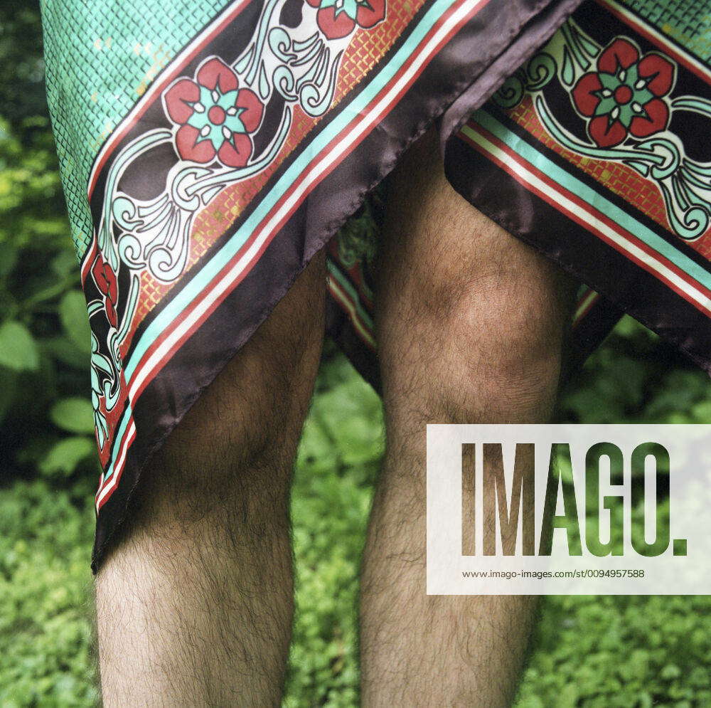 Mid-Adult Man s Hairy Legs with Skirt