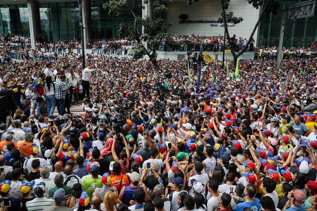 Opponents of the government of Nicolas Maduro march in Caracas ...