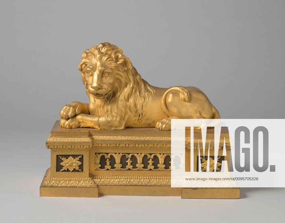 Fire horn of gilt bronze in the form of a lying lion on a base, Gilded ...