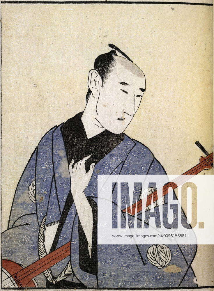JAPAN Theatre Kabuki actor playing a traditional instrument the ...